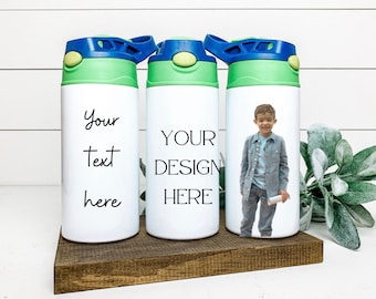 May include: Three white water bottles with green and blue lids. The bottles have different designs: one says "Your text here", one says "Your design here", and one has a photo of a young boy.