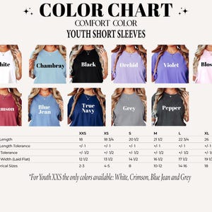 May include: Color chart for youth short sleeve shirts with size chart.  Colors include white, chambray, black, orchid, violet, blossom, crimson, blue jean, true navy, grey, and pepper.  Sizes include XXS, XS, S, M, L, and XL.  Body length, body length tolerance, chest tolerance, chest width, and numerical sizes are listed.