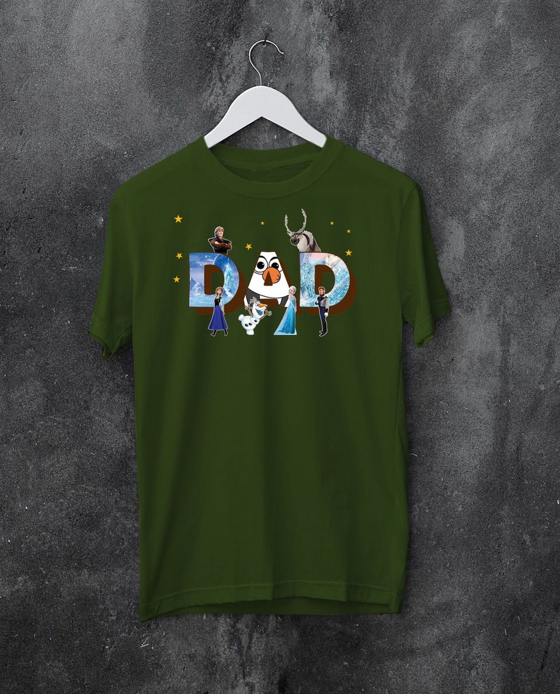 May include: Green t-shirt featuring a graphic of the characters from the film Frozen spelling out the word "DAD".