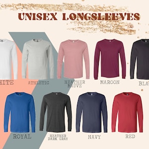 May include: A selection of unisex long-sleeve shirts in various colors, including white, athletic grey, heather mauve, maroon, black, royal blue, heather dark grey, navy, and red.  The shirts are all long-sleeved and have a crew neck.