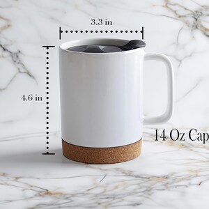 May include: White ceramic mug with a cork base and a black lid. The mug has a 14 oz capacity and measures 4.6 inches tall and 3.3 inches wide.