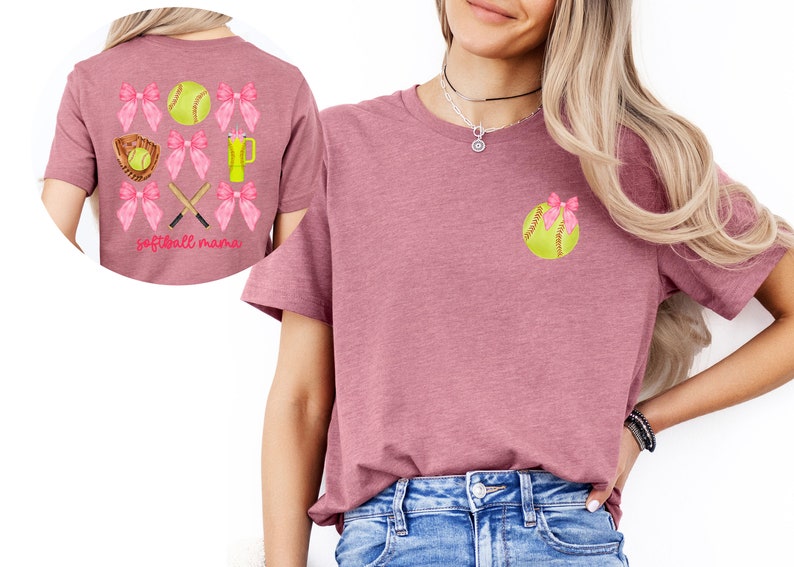 May include: A pink t-shirt with a softball and pink bows on the front and a softball, bows, bats, and a glove on the back. The text "softball mama" is on the back of the shirt.