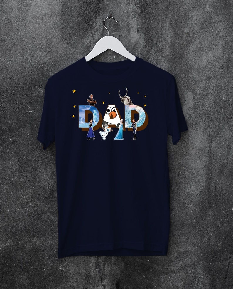 May include: A navy blue t-shirt featuring a graphic of the characters from the film Frozen spelling out the word "DAD". The characters include Olaf, Elsa, Anna, Kristoff, Sven, and Hans.