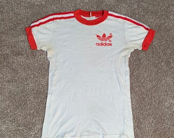 red adidas shirt