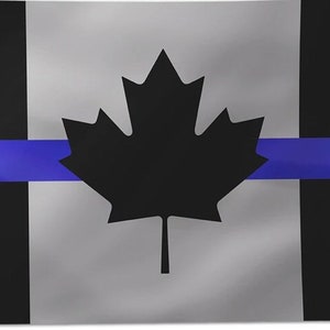 May include: A Canadian flag with a thin blue line across the middle, representing support for law enforcement. The flag is black, white, and red with a black maple leaf in the centre.