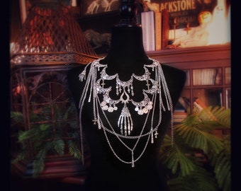 Gothic Bib Necklace with Large Skeleton Hand, Dripping Chains, Crosses, and Crescent Details