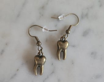 Bronze tooth earrings