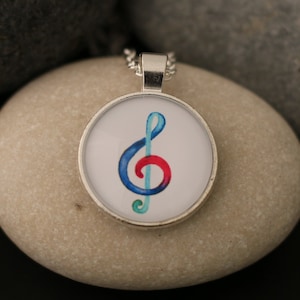 Clef necklace made from self-painted watercolor, perfect for musicians or music lovers