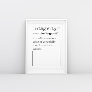 May include: A white framed print with the word "integrity" in black text. The definition of the word is also included in black text: "noun. /in-'te-grǝ-të/ irm adherence to a code of especially moral or artistic values."