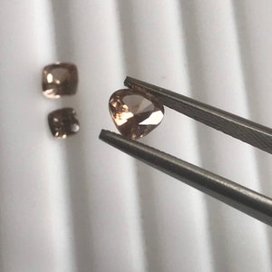 Lot 214. Moissanite. Lab created moissanite. Synthetic moissanite.light brown colour