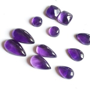 Lot 401. Amethyst cabochon. Natural Amethyst cabochon.