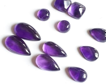 Lot 401. Amethyst cabochon. Natural Amethyst cabochon.