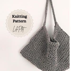 May include: A gray knitted tote bag with a crocheted texture. The bag has a simple design and is hanging from a white wall. The text "Knitting Pattern Lili Plit" is written in a circle on the wall.