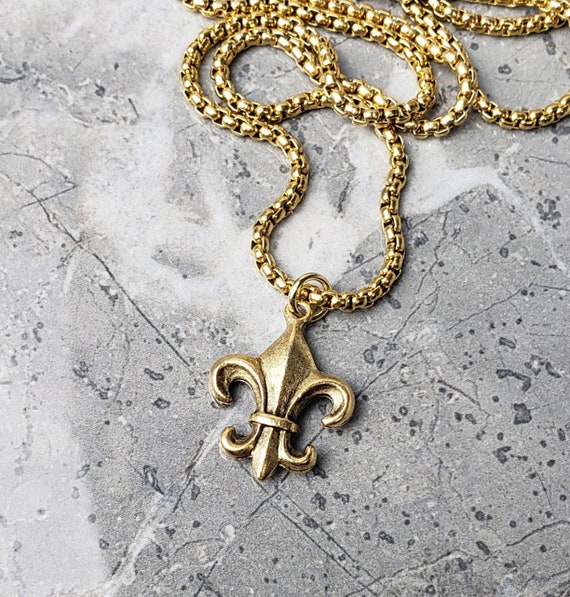 Vente Pendentif homme acier ancre de marine argentée à pierre claire