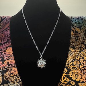 sun necklace with unique face
