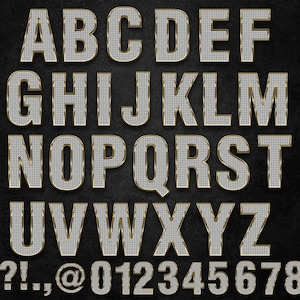 May include: A silver and gold alphabet with diamond-like texture. The letters are uppercase and include the numbers 0-9 and symbols #, ?, !, ., , and @.