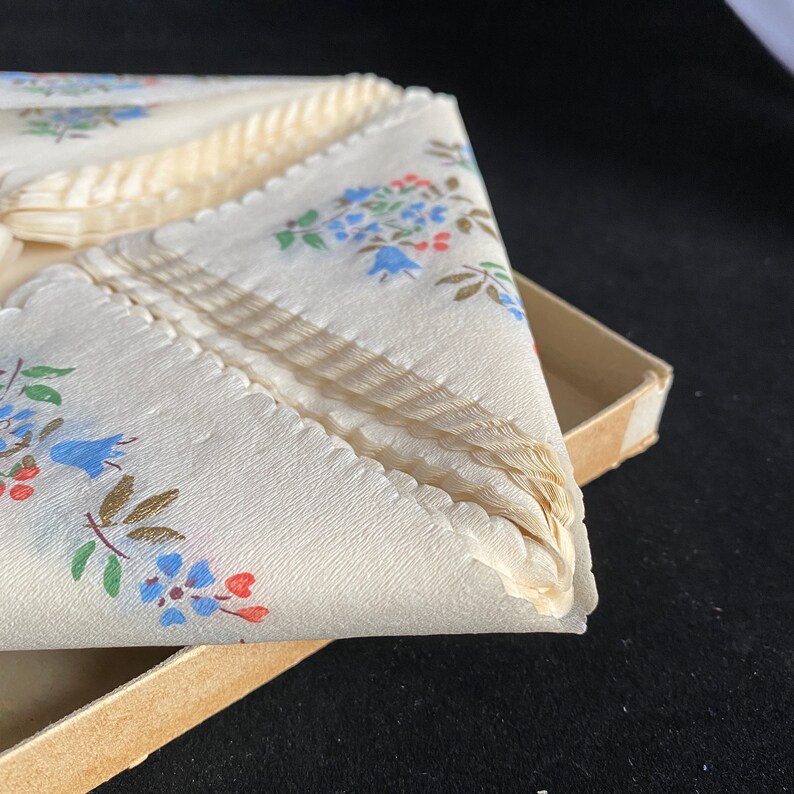 Swan Mill Crepe Napkins with Gold Accents and Blue and Pink Flowers