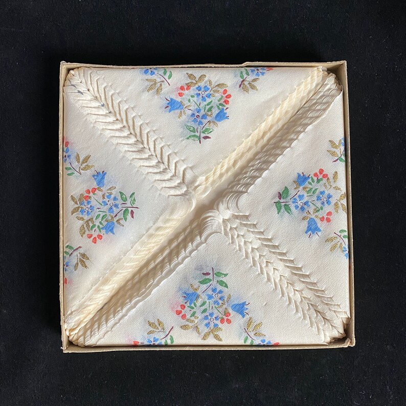 Swan Mill Crepe Napkins with Gold Accents and Blue and Pink Flowers