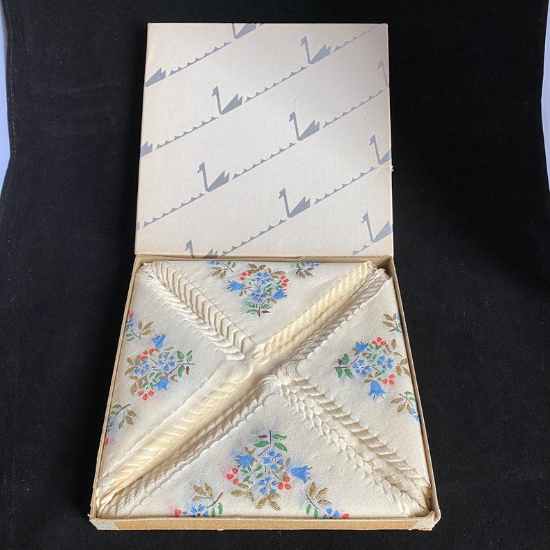 Swan Mill Crepe Napkins with Gold Accents and Blue and Pink Flowers