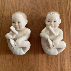 Vintage Royal Copenhagen Figurines of a Baby Playing With His Foot #027 Designed by Allan Therkelsen