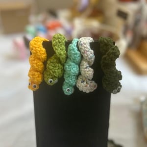Cute crochet bookworms! Available in different colors. Great unique, gifting for tweens and adults. For the book lover..