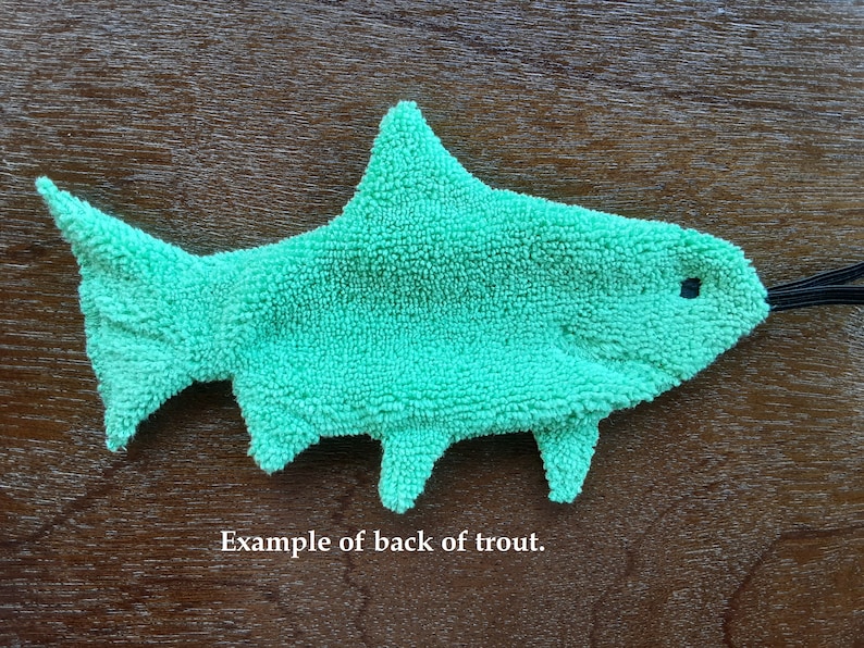 This is a view of the back side of the Rainbow Trout Smudge Fish. The back side is a solid color. Text in photo reads:  Example of back of trout.
