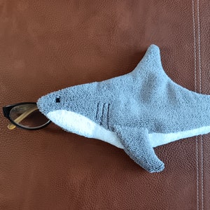 Shark shaped microfiber glasses case with glasses coming out of mouth