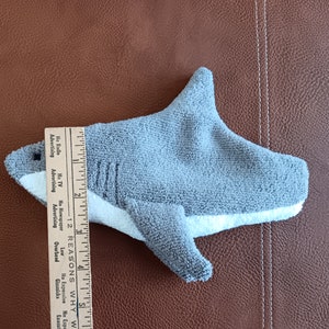 Ruler showing width of mouth of shark. Approximately 2 and a half inches