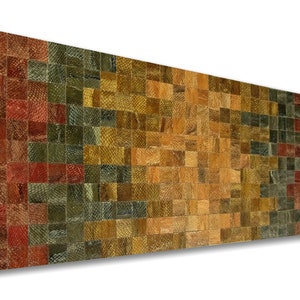 Puede incluir: Una pieza de arte de pared rectangular hecha de pequeñas baldosas cuadradas. Las baldosas están dispuestas en un patrón de rojo, marrón, verde y amarillo. Las baldosas están hechas de madera y tienen un aspecto natural y rústico.