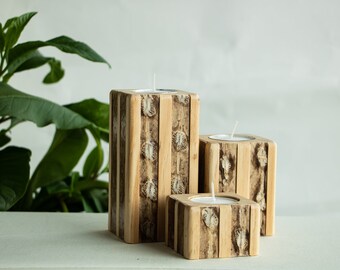 Set of 3 wooden tea light candle holders with sturgeon leather