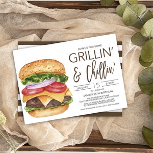 May include: A white invitation card featuring a watercolour illustration of a hamburger. The text on the card reads "Join us for some Grillin' & Chillin'" and includes details for Jamie's 35th birthday party.
