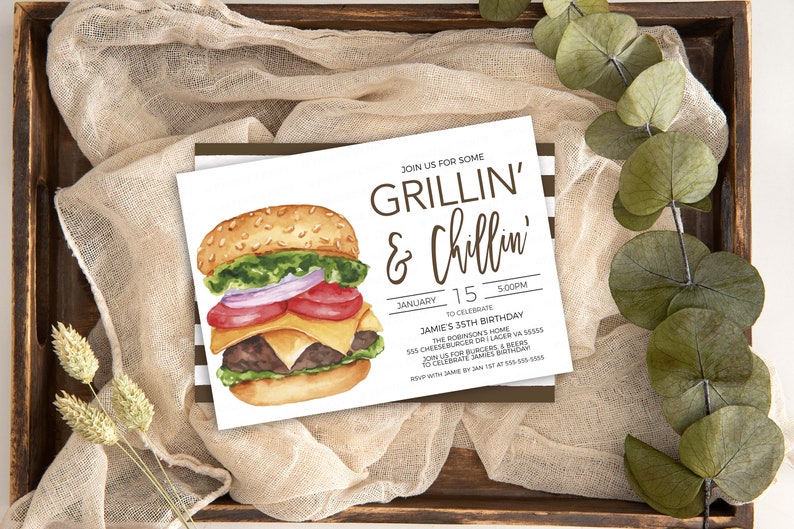 May include: A white invitation card featuring a watercolour illustration of a hamburger. The text on the card reads "Join us for some Grillin' & Chillin'" and includes details for Jamie's 35th birthday party.