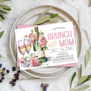 May include: A pink and white invitation card with a watercolor illustration of champagne flutes and roses. The text on the card reads "Join us for Brunch with Mom" and includes details for a Mother's Day celebration.