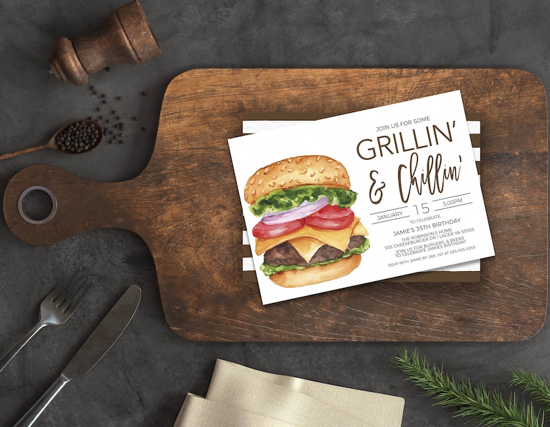 May include: A white invitation card featuring a watercolour illustration of a hamburger. The text on the card reads "Join us for some Grillin' & Chillin'" and includes details for Jamie's 35th birthday party.