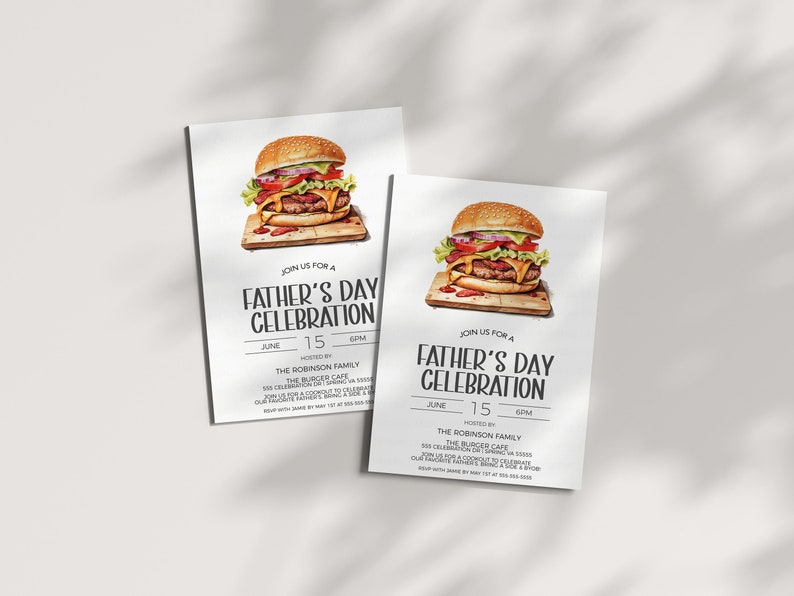 May include: A white invitation card with a picture of a hamburger on top. The text on the card reads "Join us for a Father's Day Celebration" with the date and time of the event. The event is hosted by the Robinson family at The Burger Cafe.