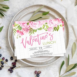 May include: A pink and green Valentine's Day lunch invitation with a floral design. The invitation says "Valentine's Lunch" and includes the date "February 14" and time "1:00PM".