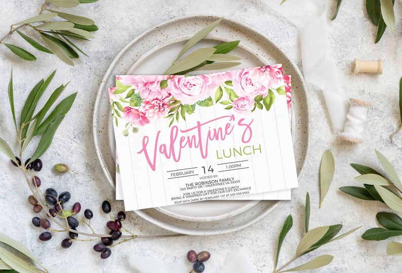 May include: A pink and green Valentine's Day lunch invitation with a floral design. The invitation says "Valentine's Lunch" and includes the date "February 14" and time "1:00PM".