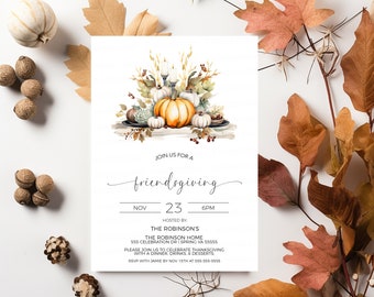 May include: A Thanksgiving invitation with a watercolor illustration of pumpkins, gourds, and candles. The text reads "Join us for a Friendsgiving, Nov 23, 6PM, Hosted by The Robinson's, The Robinson Home, 555 Celebration Dr, Spring VA 55555, Please join us to celebrate Thanksgiving with a dinner, drinks & desserts. RSVP with Jamie by Nov 15th at 555-555-5555."
