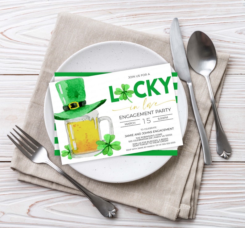May include: An engagement party invitation with a St. Patrick's Day theme. The invitation features a green leprechaun hat, a mug of beer, and shamrocks. The text reads "Lucky in Love" and includes event details.