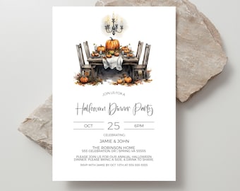 May include: A Halloween dinner party invitation with a watercolor illustration of a table setting with pumpkins, a chandelier, and fall leaves. The invitation reads "Join us for a Halloween Dinner Party" with the date "Oct 25" and time "6PM". It also includes the names "Jamie & John" and the address "The Robinson Home, 555 Celebration Dr, Spring VA 55555".