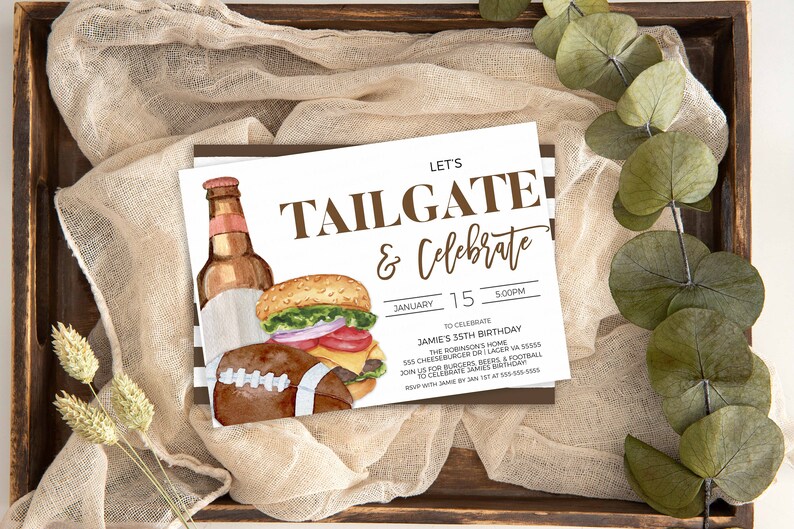 May include: A brown and white invitation card with the text "Let's Tailgate & Celebrate" in brown text. The card features a watercolor illustration of a beer bottle, a hamburger, and a football.