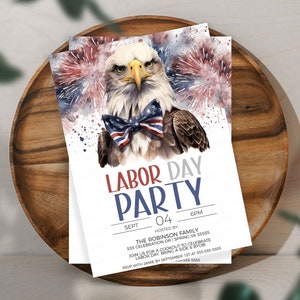 May include: A Labor Day party invitation featuring a watercolor illustration of a bald eagle wearing a red, white, and blue bow tie. The eagle is set against a background of red, white, and blue fireworks. The text on the invitation reads "Labor Day Party" with the date "Sept 04" and time "6PM". The invitation also includes the host's name, address, and RSVP information.