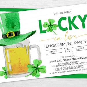 May include: Engagement party invitation with a watercolor illustration of a green leprechaun hat, a beer mug, and shamrocks. The invitation reads "Lucky in Love" and includes event details such as the date, time, and location.
