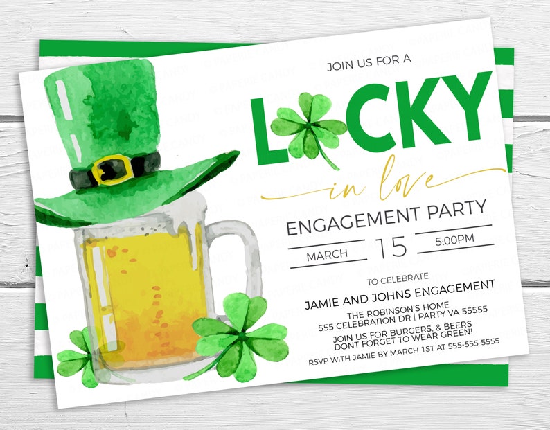 May include: Engagement party invitation with a watercolor illustration of a green leprechaun hat, a beer mug, and shamrocks. The invitation reads "Lucky in Love" and includes event details such as the date, time, and location.