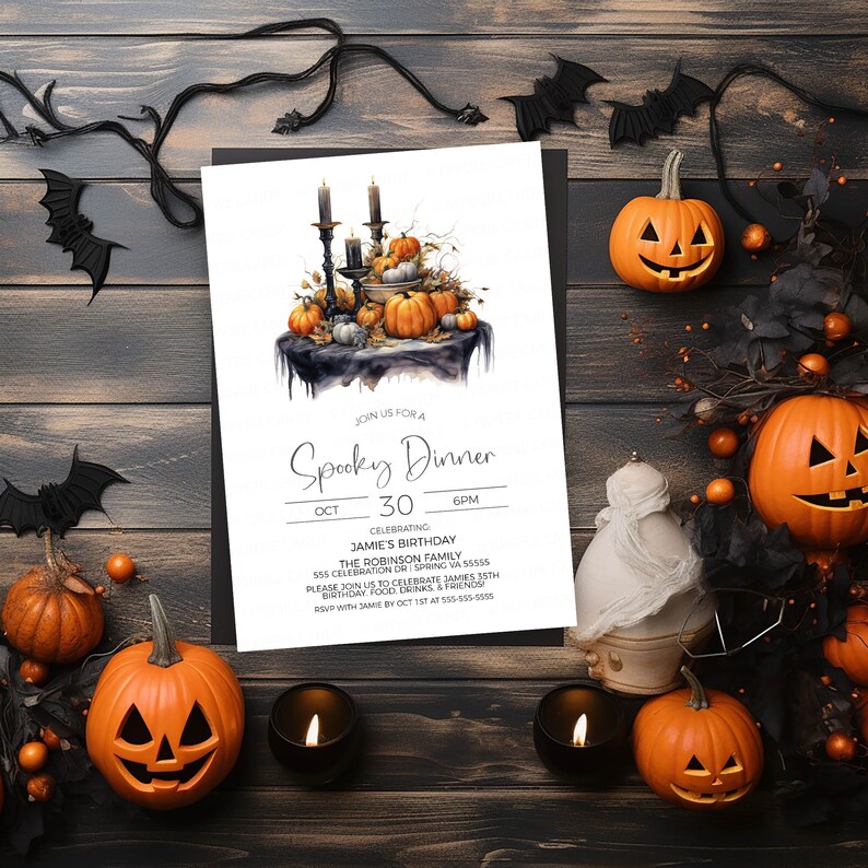 May include: A white invitation card with black text for a Spooky Dinner on October 30th at 6 PM. The invitation features a watercolor illustration of a black table with pumpkins, candles, and a black cauldron. The text reads "Join us for a Spooky Dinner, Oct 30, 6 PM, Celebrating Jamie's Birthday, The Robinson Family, 555 Celebration Dr, Spring VA 55555, Please join us to celebrate James 35th Birthday, Food, Drinks & Friends, RSVP with Jamie by Oct 1st at 555-535-5555."