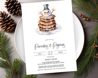 May include: A white invitation with a watercolor illustration of a snowman sitting on top of a stack of pancakes. The text reads "Join us for Pancakes & Pajamas, Dec 22, 9am, Hosted by: Jamie & John, The Robinson Home, 555 Celebration Dr | Winter VA 55555, Please join us to celebrate winter breakfast & drinks will be served, RSVP with Jamie by Dec 10th at 555-555-5555."