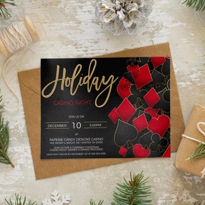 May include: A black and gold invitation with a red and black playing card design. The invitation is for a Holiday Casino Night on December 10th at 5:00 PM. The event is hosted by Paperie Candy Designs Casino at 555 Merry & Bright Dr Winter VA 55555. RSVP with Taylor by December 1st at 555-555-5555.