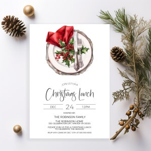May include: A Christmas lunch invitation featuring a watercolour illustration of a white plate with a red napkin, silver cutlery, and holly berries. The text reads "Join us for a Christmas Lunch, Dec 24, 12PM, Hosted by: The Robinson Family, The Robinson Home, 555 Celebration Dr | Winter VA 55555, Please join us for a Christmas lunch to celebrate the season! RSVP with Jamie by Dec 10th at 555-555-5555."