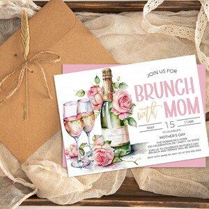 May include: A white invitation card with pink and gold accents. The card features a watercolor illustration of champagne flutes and a bottle of champagne with pink roses. The text on the card reads "Join us for Brunch with Mom" and includes the date, time, and location of the event.
