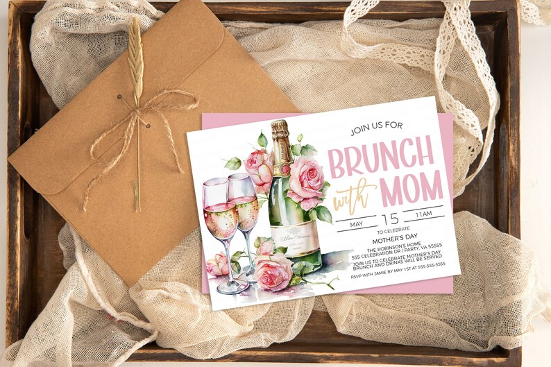 May include: A white invitation card with pink and gold accents. The card features a watercolor illustration of champagne flutes and a bottle of champagne with pink roses. The text on the card reads "Join us for Brunch with Mom" and includes the date, time, and location of the event.